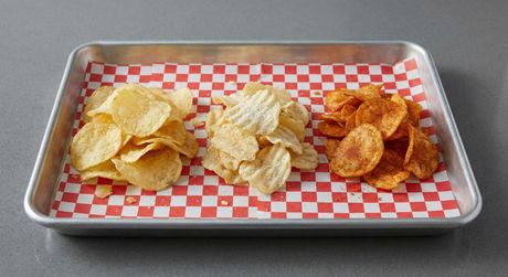 A chalkboard with the words image coming soon written on it