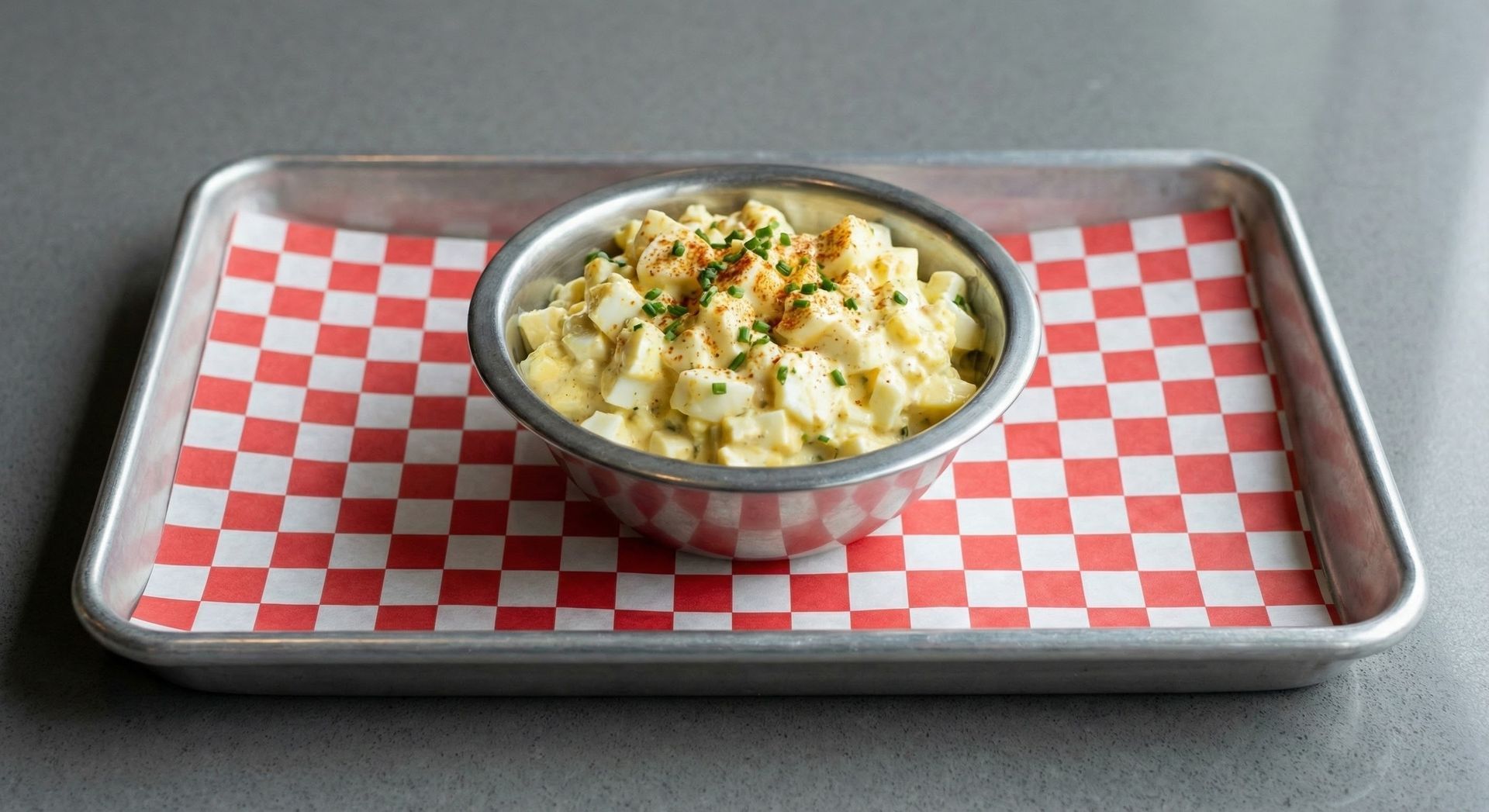 A chalkboard with the words image coming soon written on it