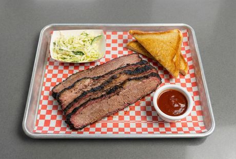 A chalkboard with the words image coming soon written on it