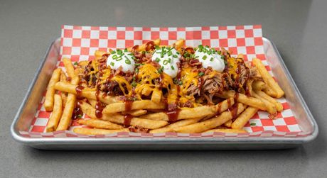 A chalkboard with the words image coming soon written on it