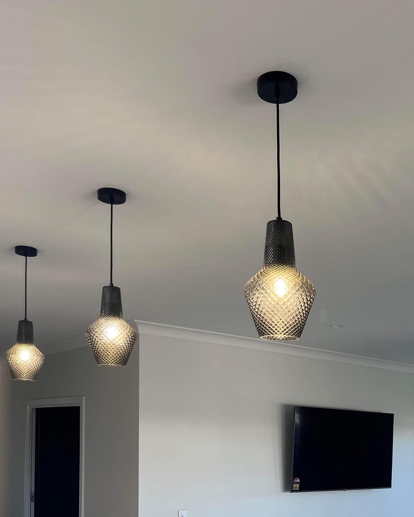Three black pendant lights with textured glass shades — Col Groves Electrics Pty Ltd in Ballina, NSW