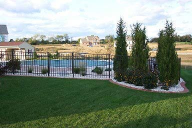 Trees With Aluminum Pool Fence | Harrisburg, PA | Tyson Fence Co.