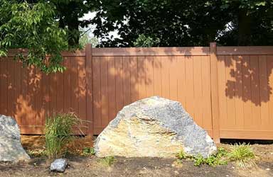 A Big Stone With PVC Fence | Harrisburg, PA | Tyson Fence Co.