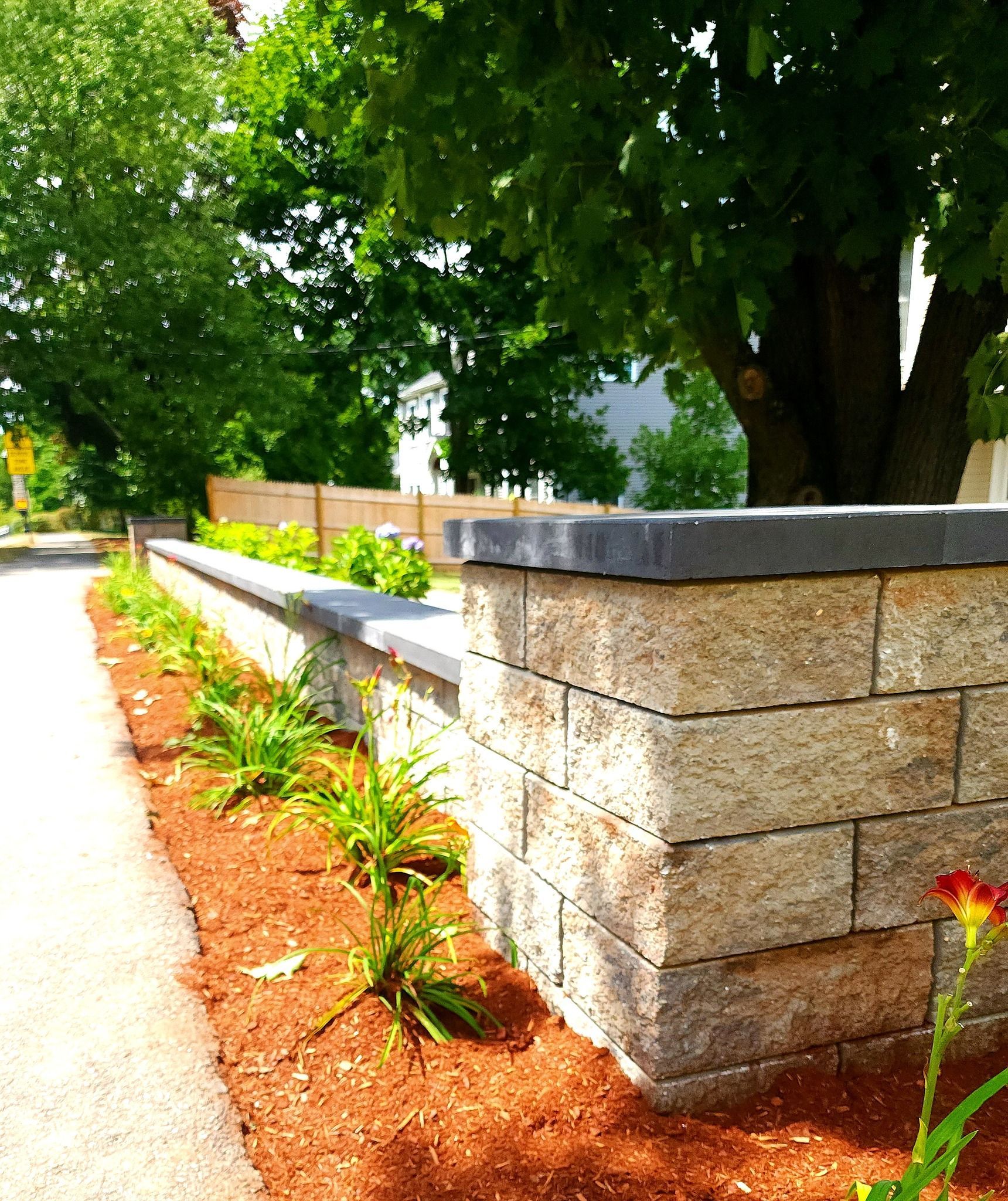 Decorative stone wall providing beautiful curb appeal