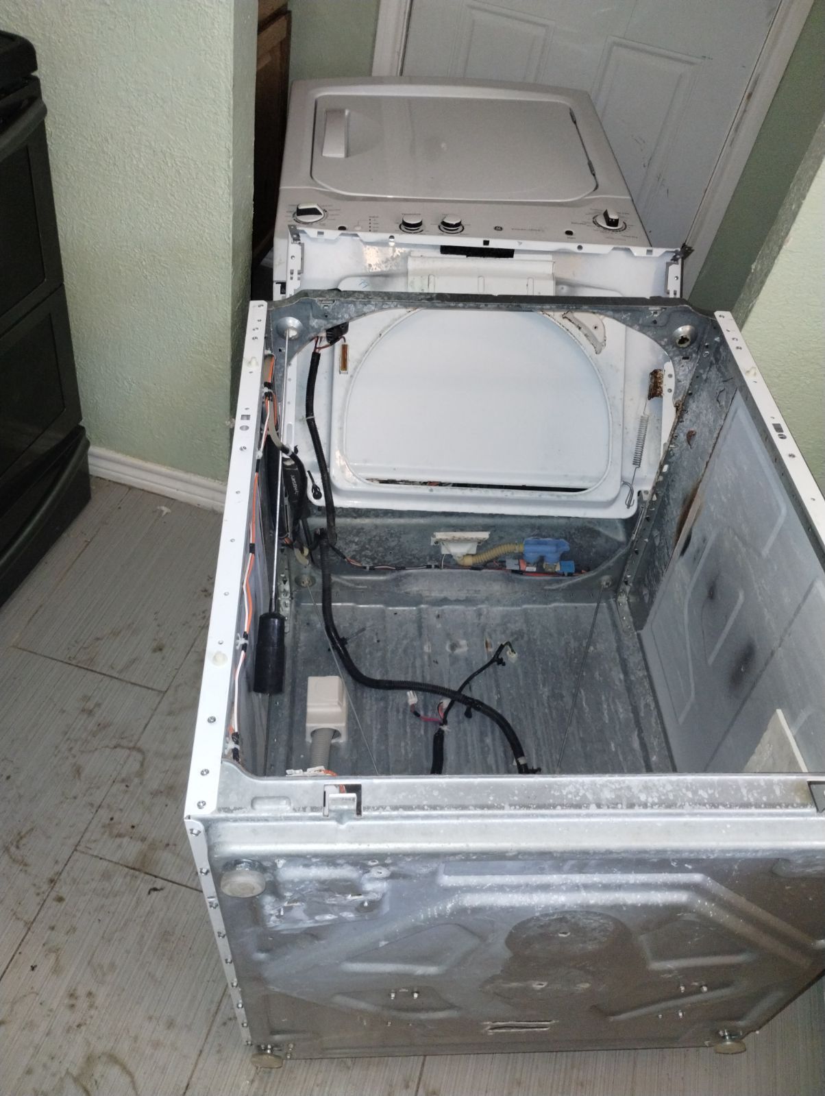 The inside of a washer and dryer with the door open