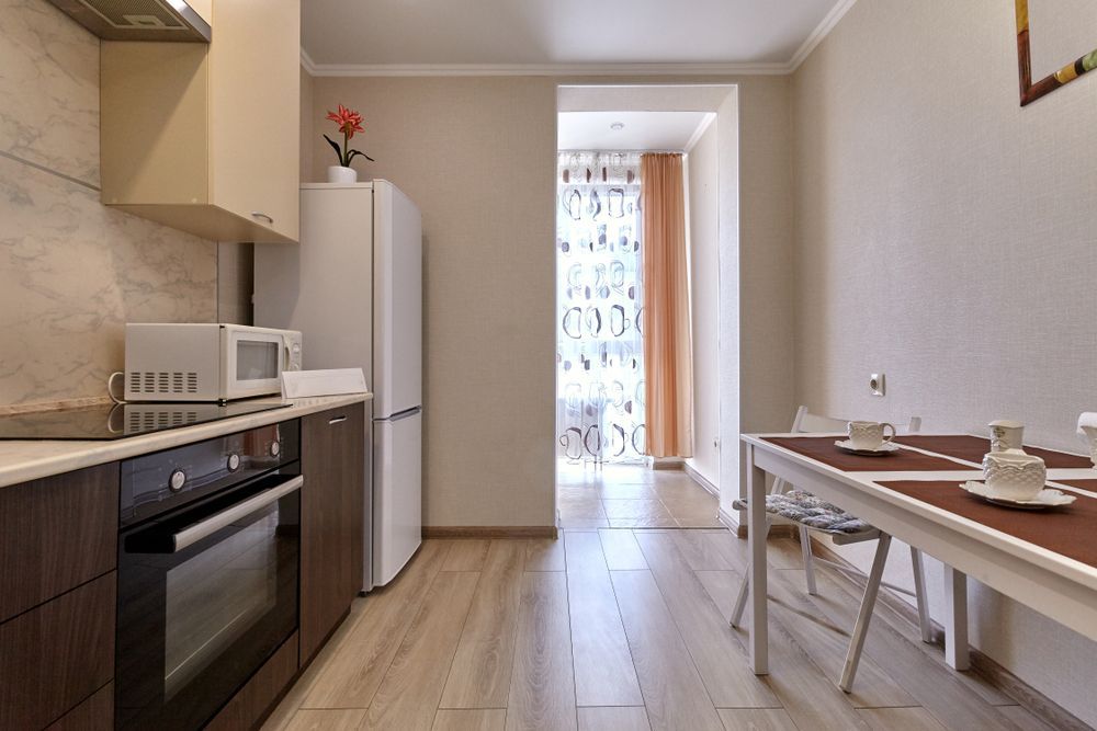 A Kitchen with A Table and Chairs and A Refrigerator — Factory Seconds Coffs Harbour in Grafton, NSW