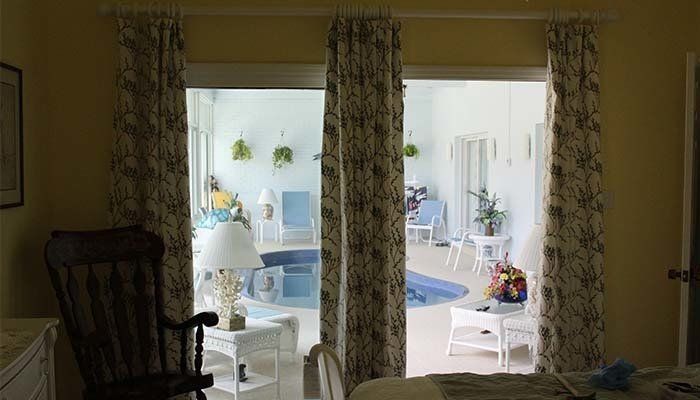 Curtain Inside the House — Okeechobee FL — Custom Window Treatments & Blinds