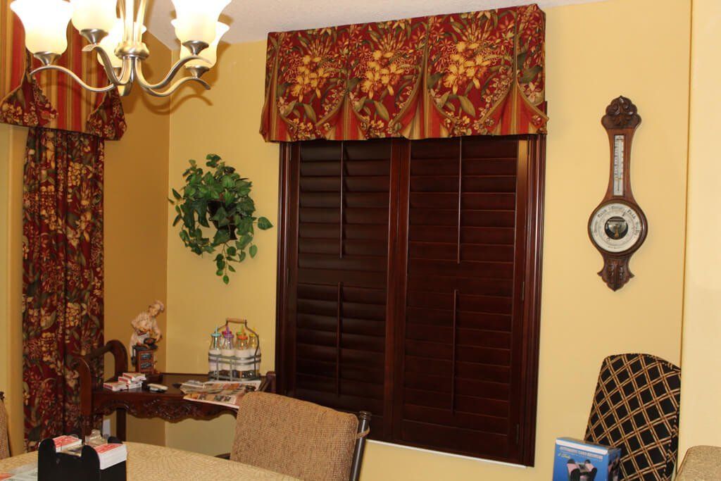 Door with Curtain — Okeechobee FL — Custom Window Treatments & Blinds