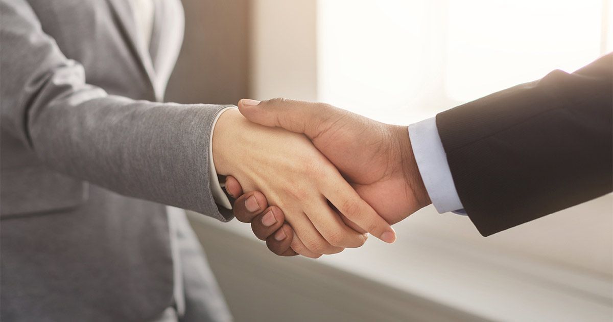 business people shaking hands