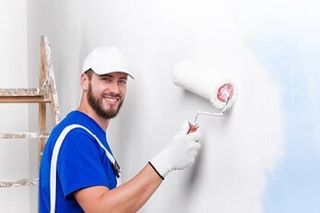 Man painting wall — Interior Painting in Salem, OR