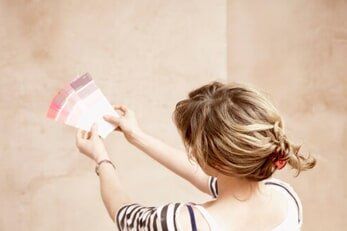 Woman choosing color from palette — Interior Painting in Salem, OR