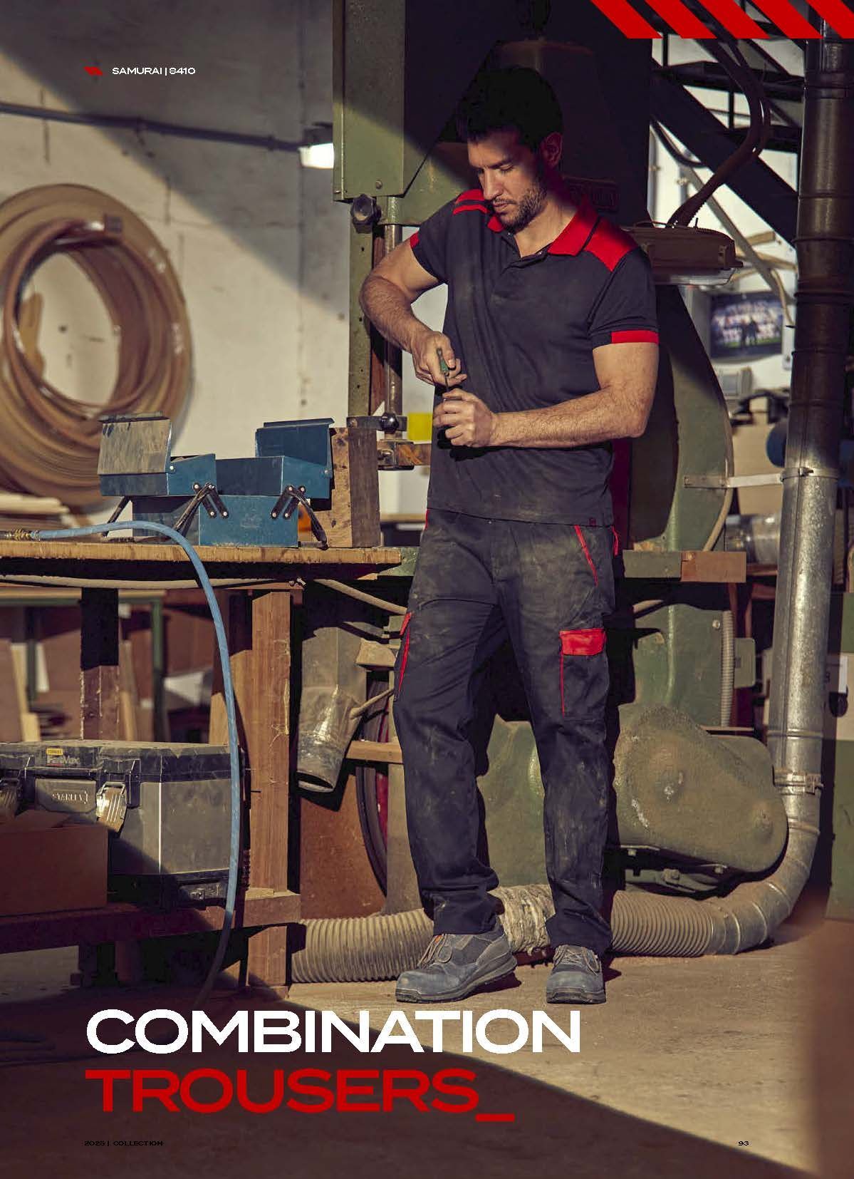 Ένας άντρας εργάζεται σε ένα εργαστήριο φορώντας παντελόνι συνδυασμού.