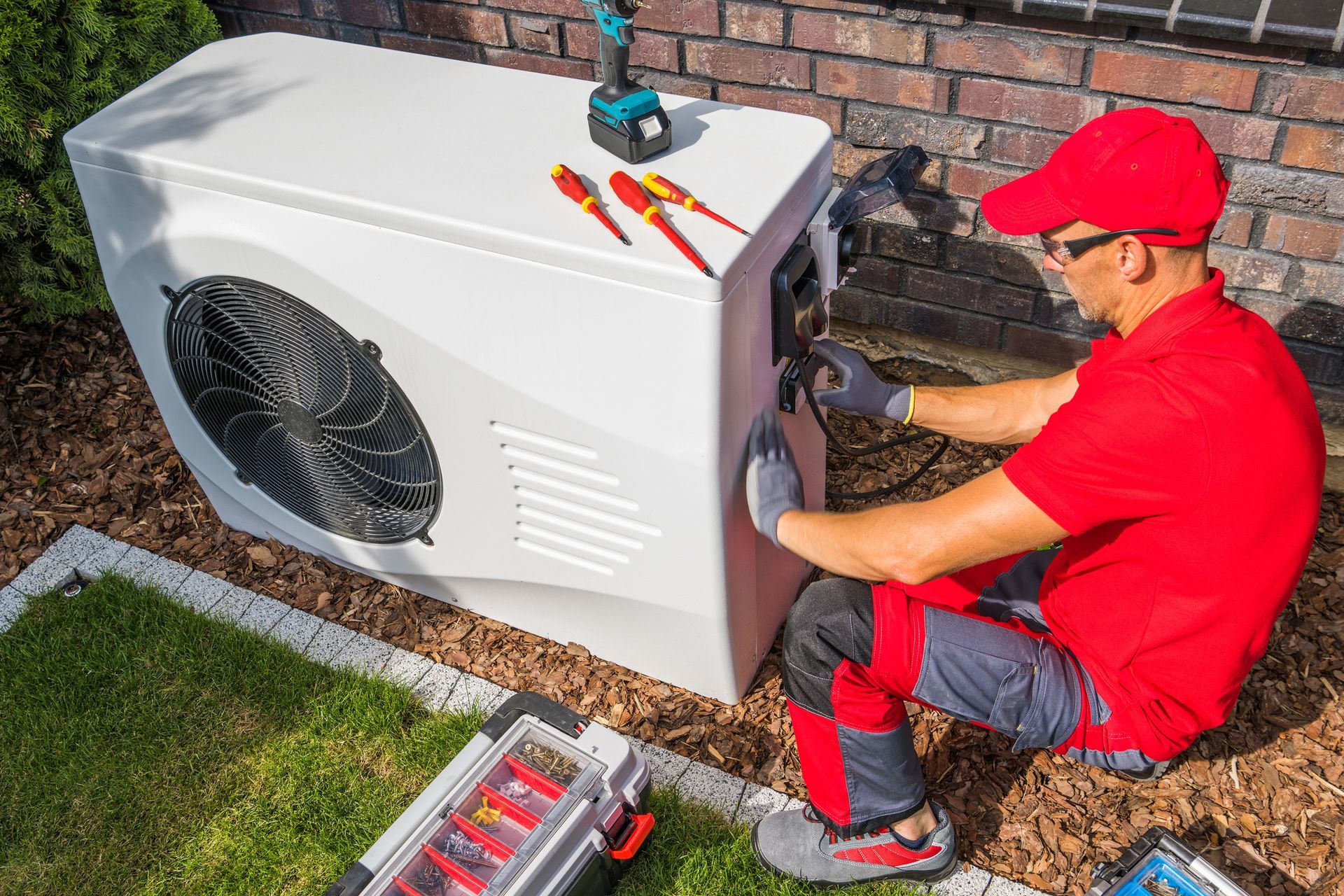 A technician doing HVAC maintenance in Lusby, MD