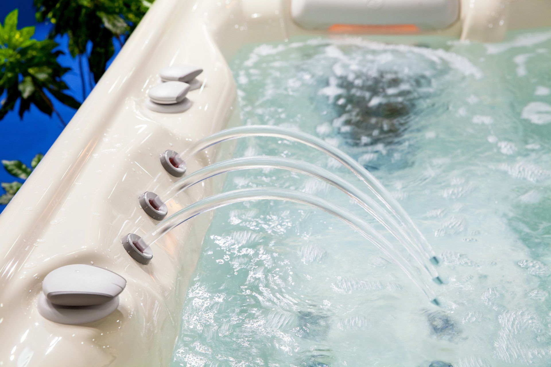 A close up of a hot tub with water coming out of it.
