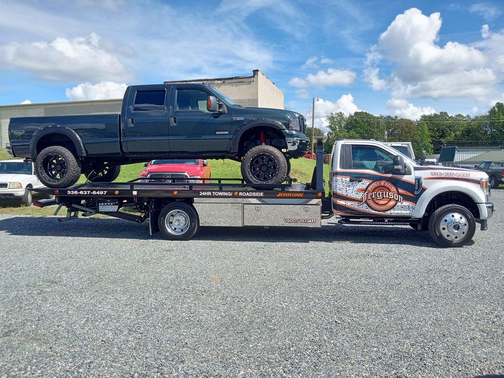 Towing A Car — Reidsville, NC — Ferguson Paint & Body Towing & Recovering Inc.
