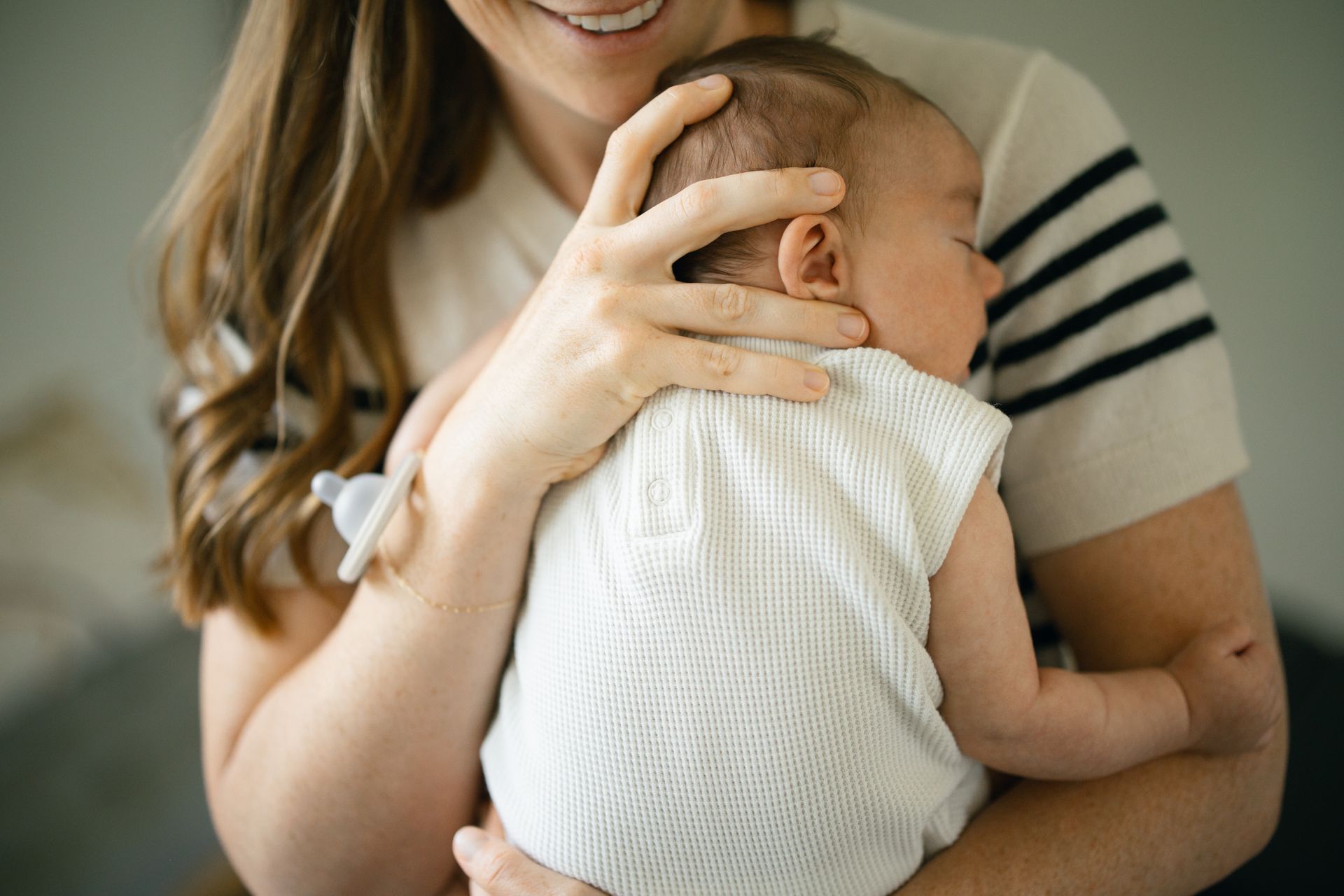 Chiropractor adjusting an infant at Living Water Chiropractic