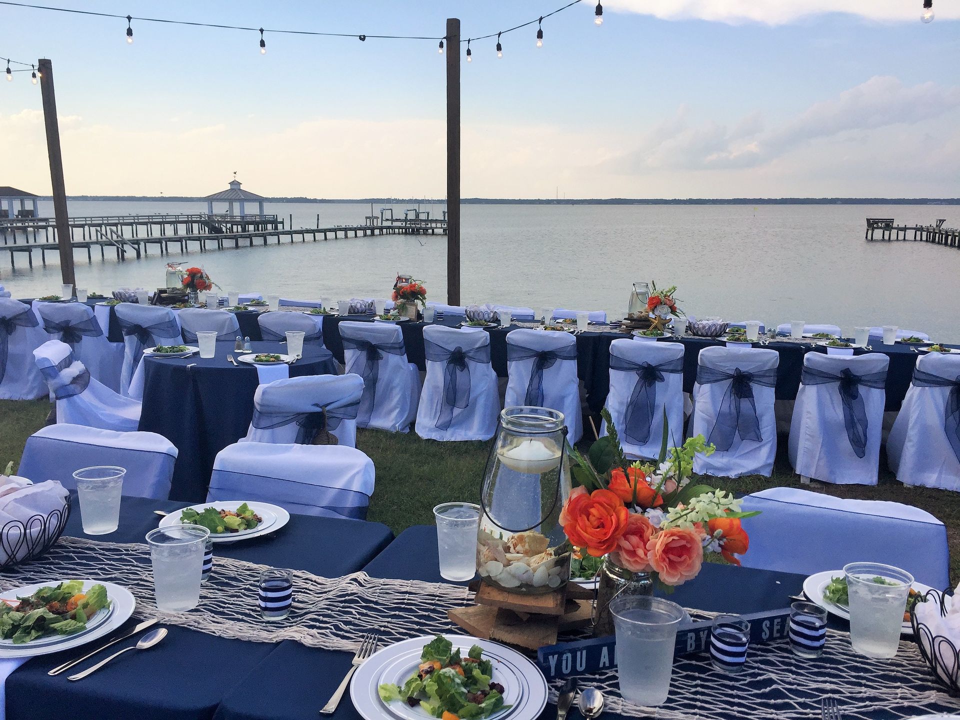 outdoor waterside wedding reception