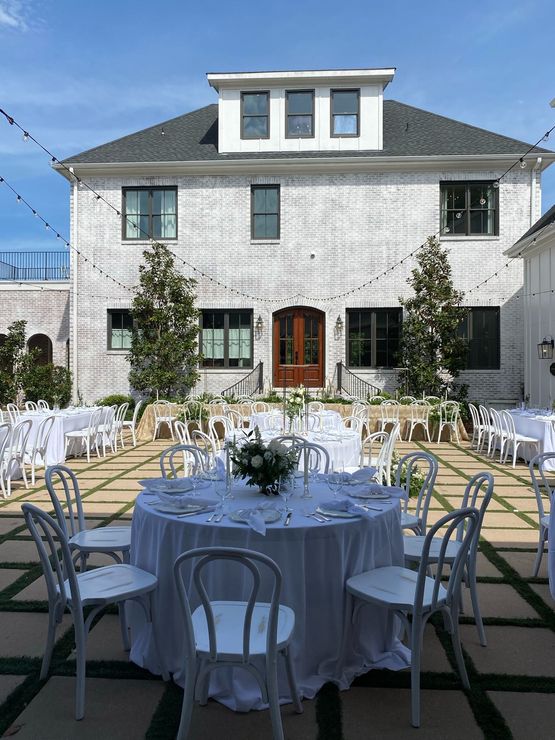 outdoor wedding reception in venue courtyard