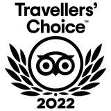 The logo for travellers choice 2022 is a black and white logo with an owl and laurel wreath.