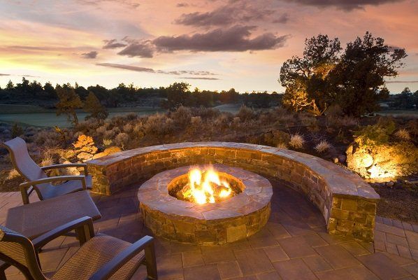 Landscaped yard with firepit