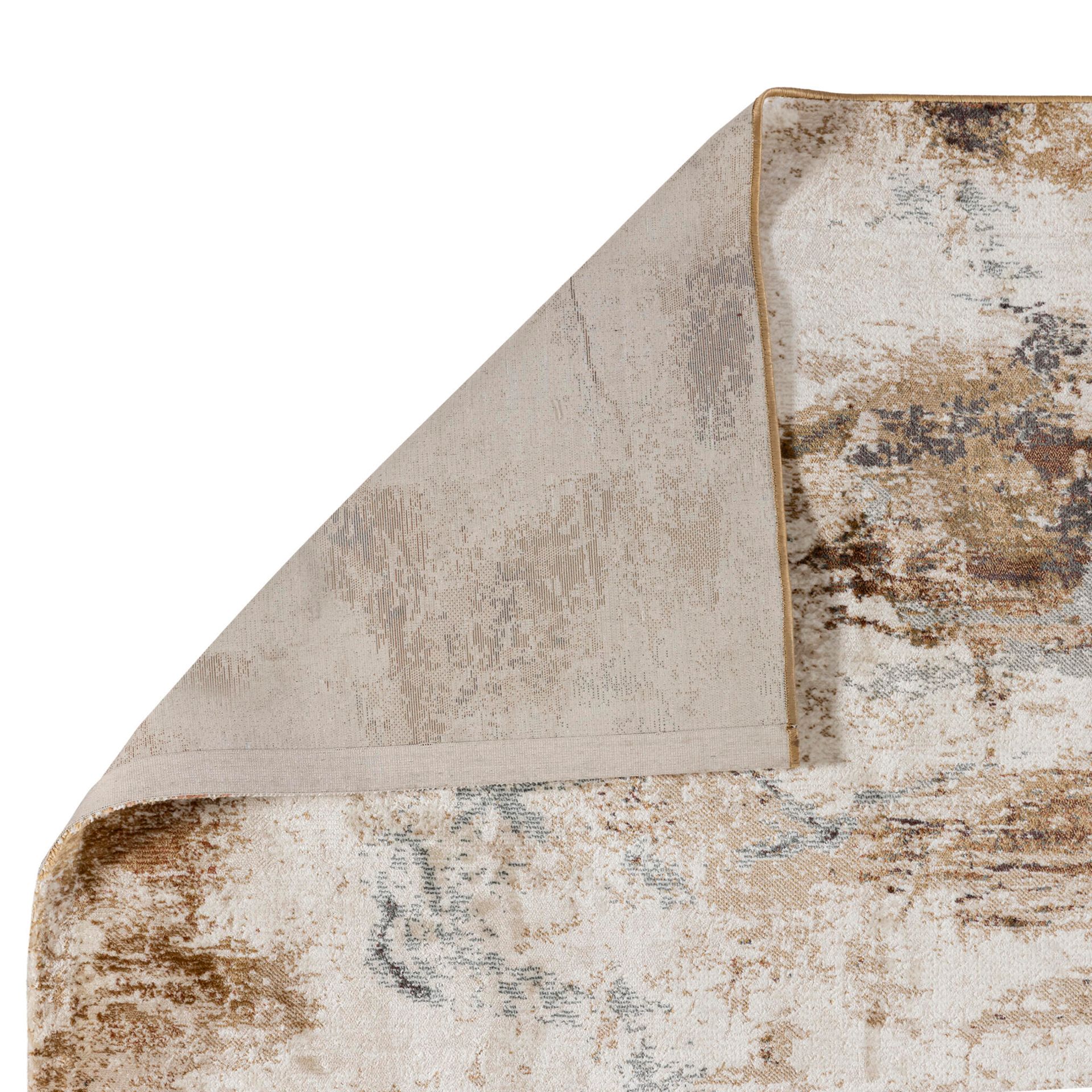 Abstracte beige en bruine textuur met gevlekte, verweerde plekken.