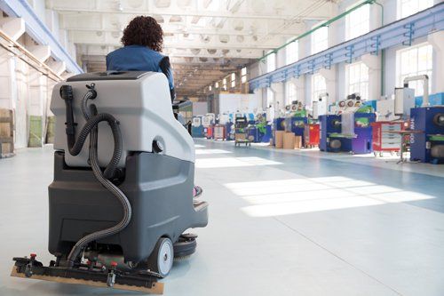 Equipment being used for cleaning a commercial space