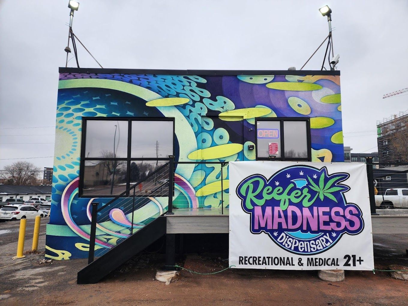a building with a sign that says reefer madness on it