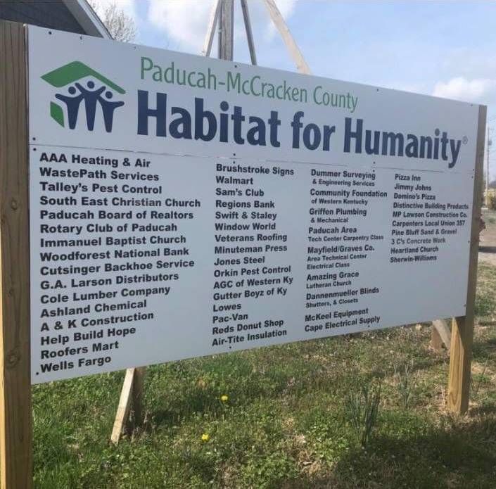 A sign for paducah mccracken county habitat for humanity