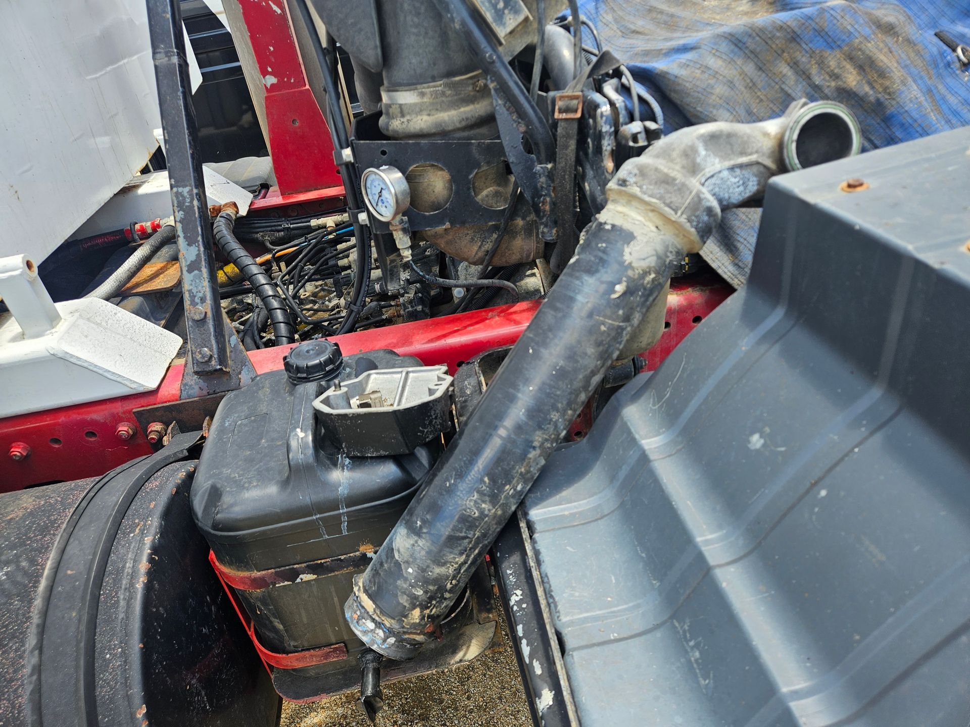 Black Fuel Tank and Large Hose — Cap Coast Maintenance In Alton Downs, QLD