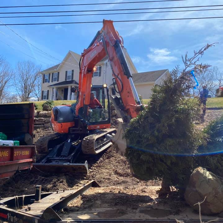 Large Yellow Excavator — Trumbull, CT — Pepper's Landscaping & Lawn Service, Inc.