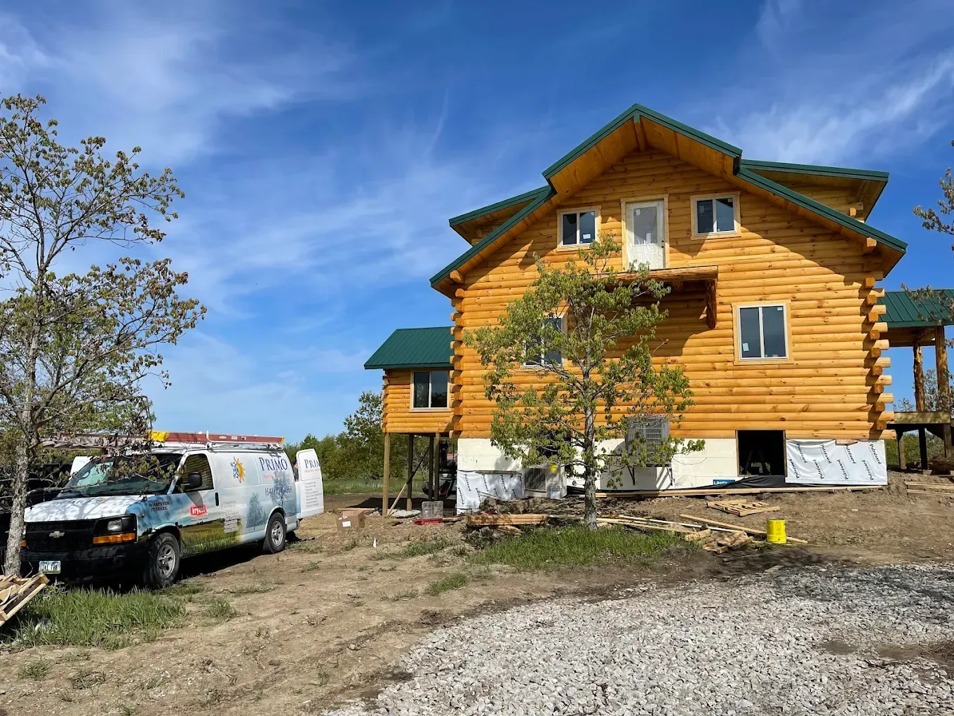 Woman at desk gestures toward man standing, in office setting.