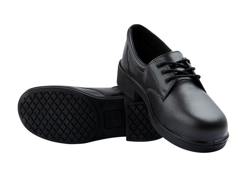 A pair of black shoes with a rubber sole on a white background.