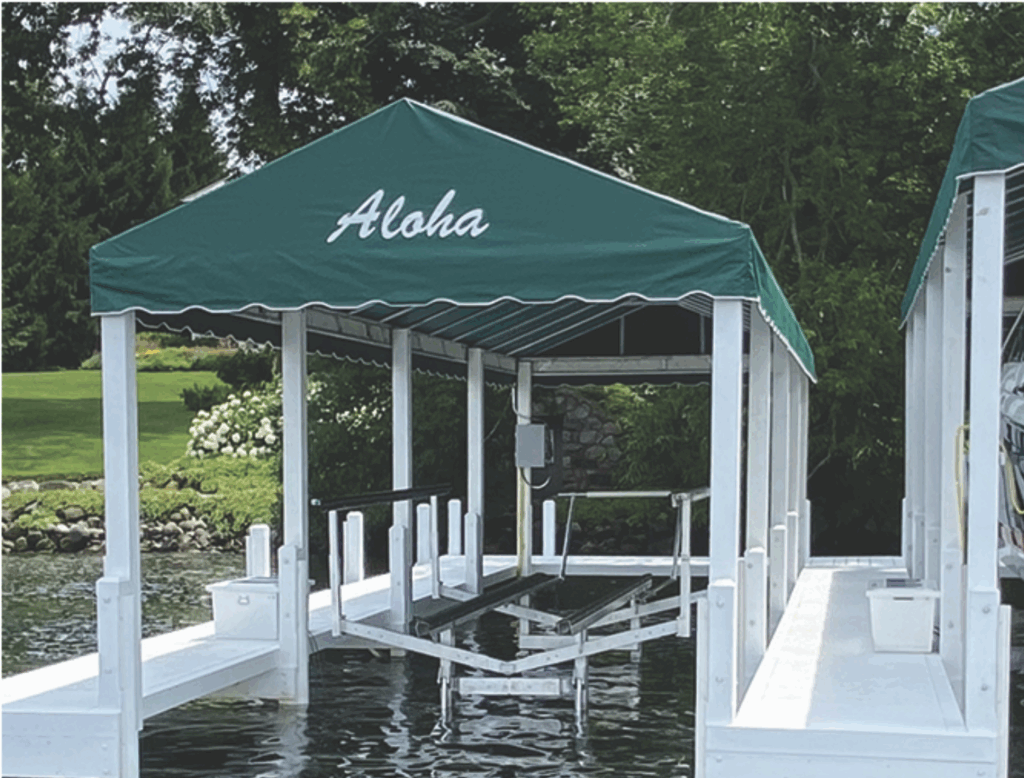 A dock with a green roof