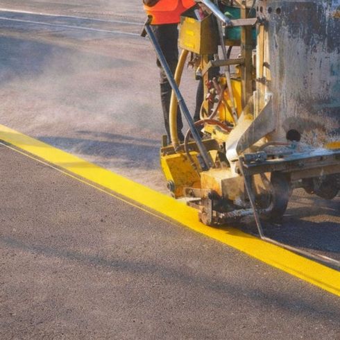 Parking Lot Striping Machine Laying down lines on concrete in San Francisco