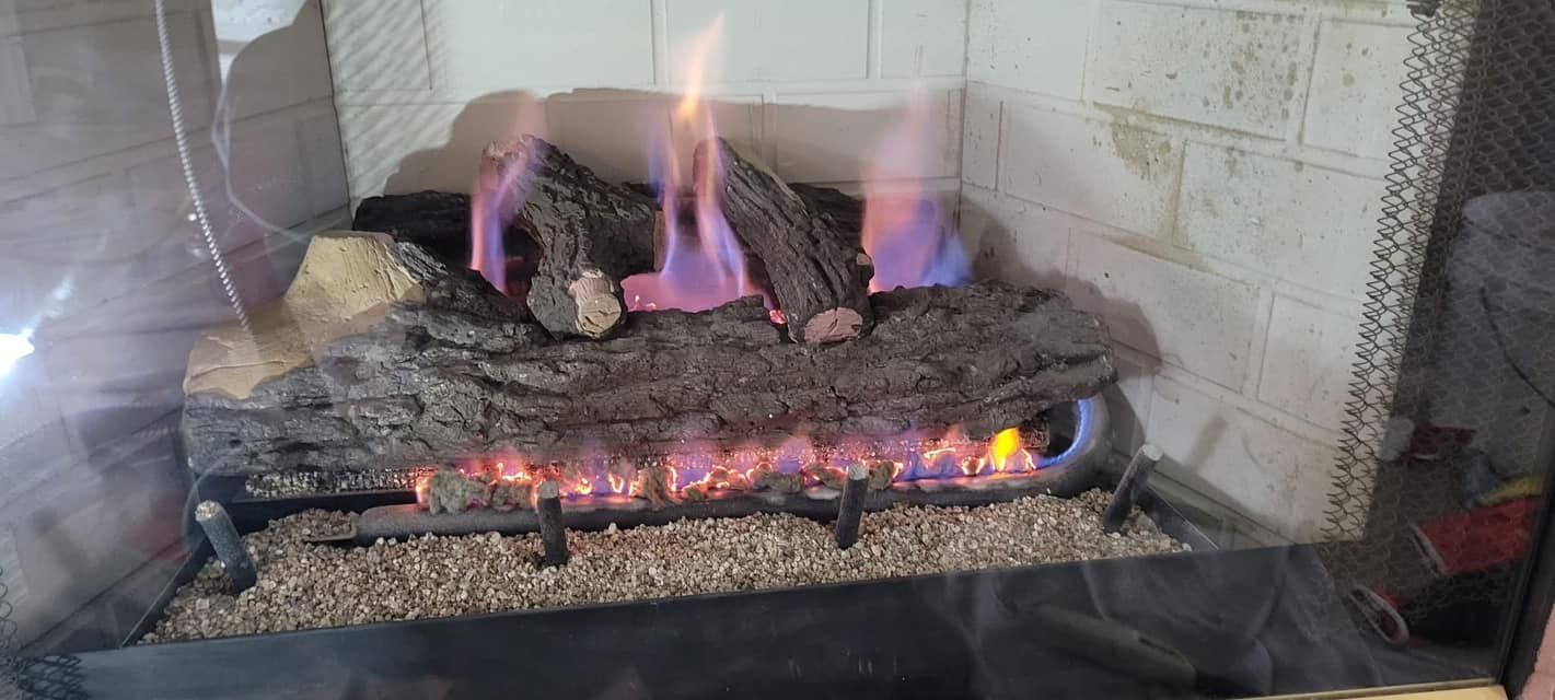 A man is loading boxes into the back of a van.