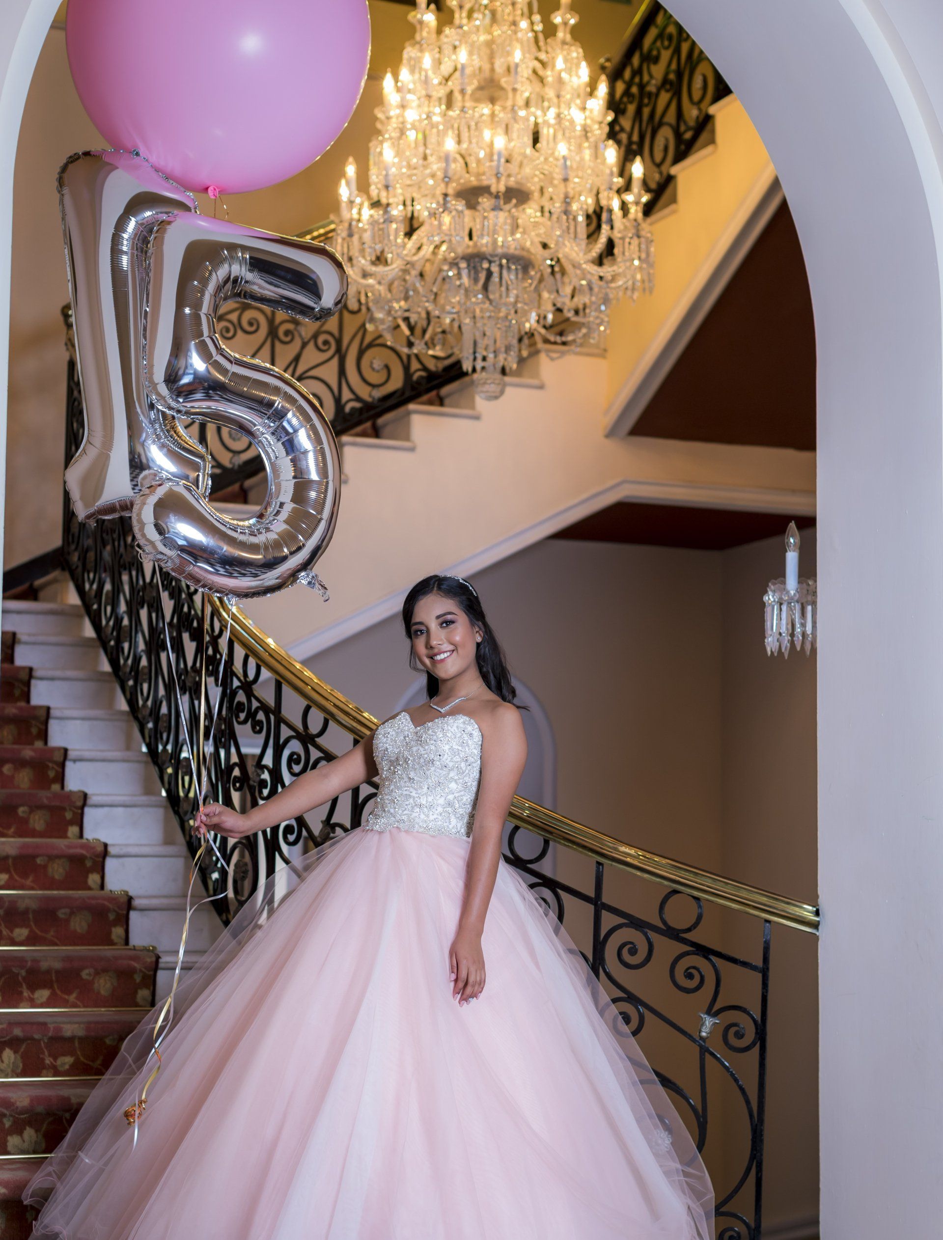 quinceanera 360 photo booth rental girl holding balloons