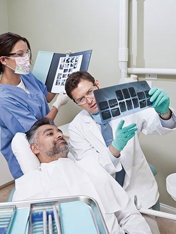 Dentist and patient - Family Dentistry in Mount Laurel and Cherry Hill, NJ