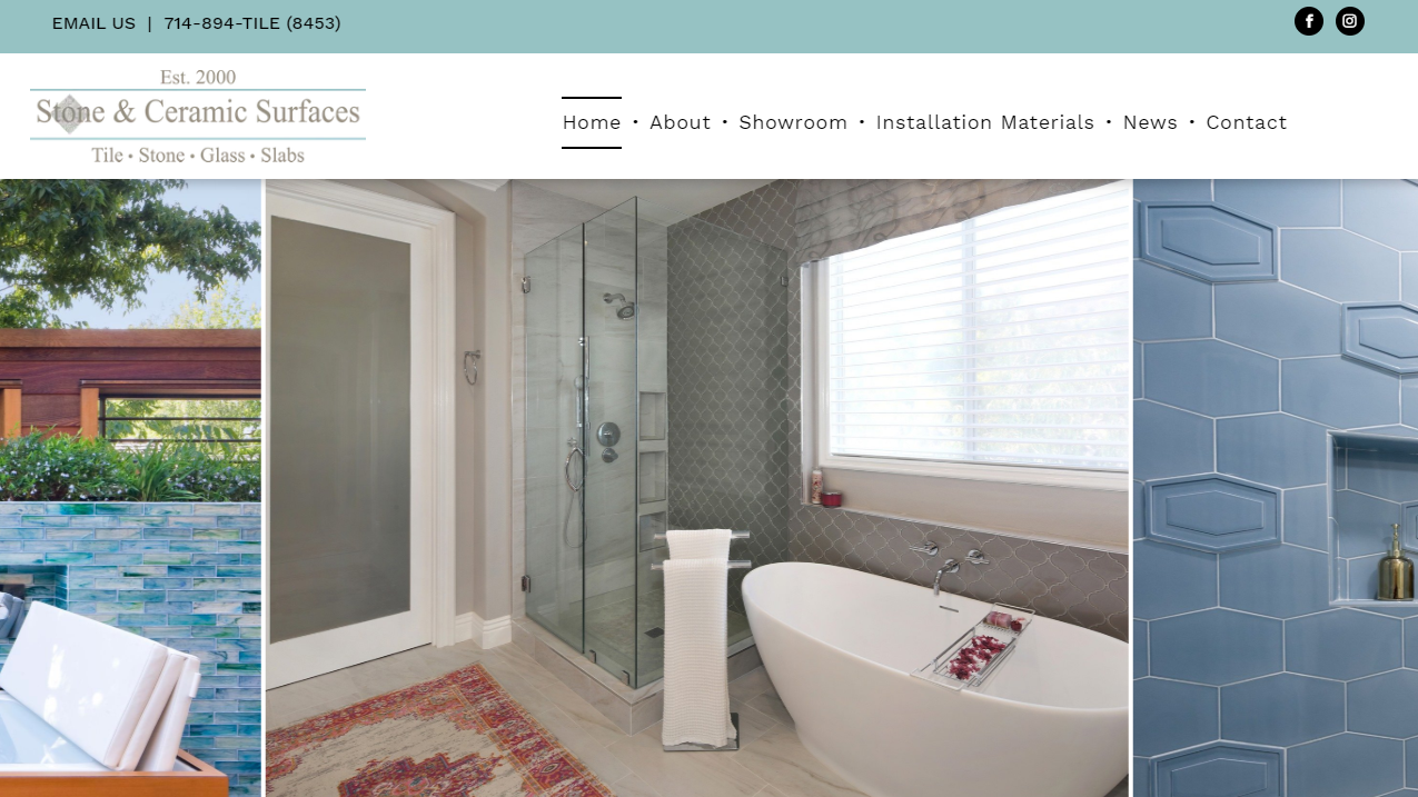 Bathroom featuring a white soaking tub, glass shower, and patterned blue tile.