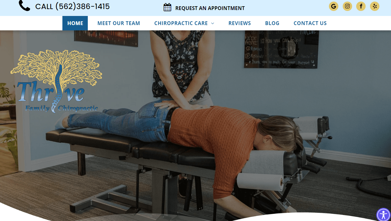 Chiropractor adjusting a patient's back in office; woman lying prone on table.