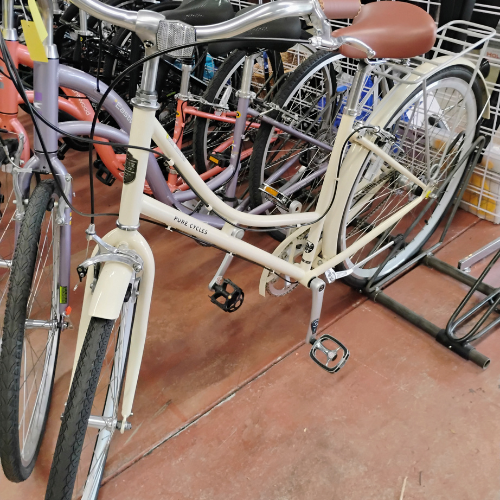 A close up of the front wheel of a bicycle