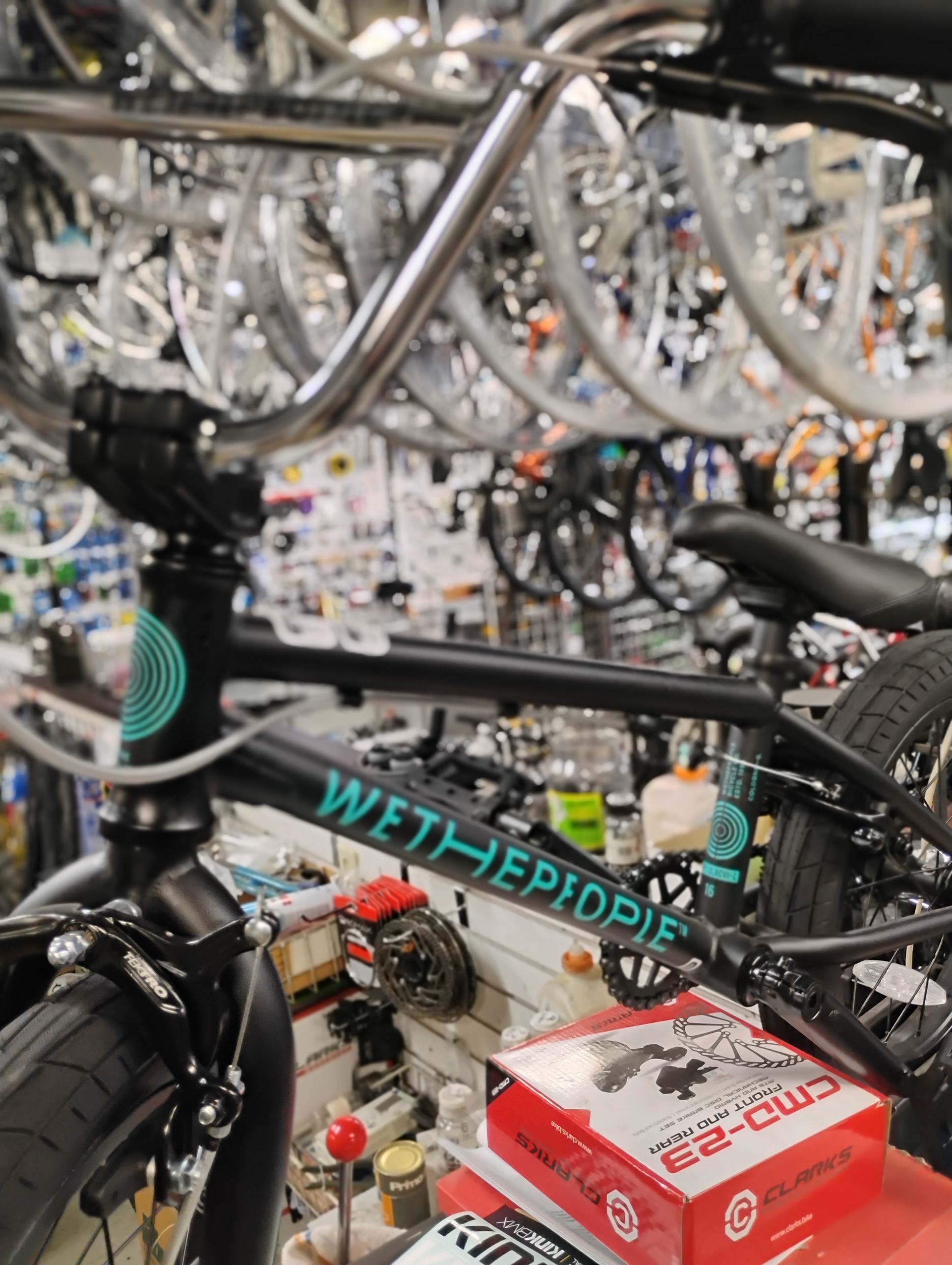 A bicycle is parked on the side of a road