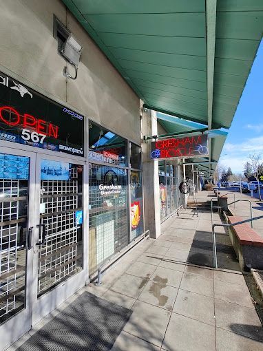 A store front with a sign that says `` open '' on it.