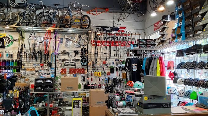 A bicycle shop filled with lots of bicycles and accessories.