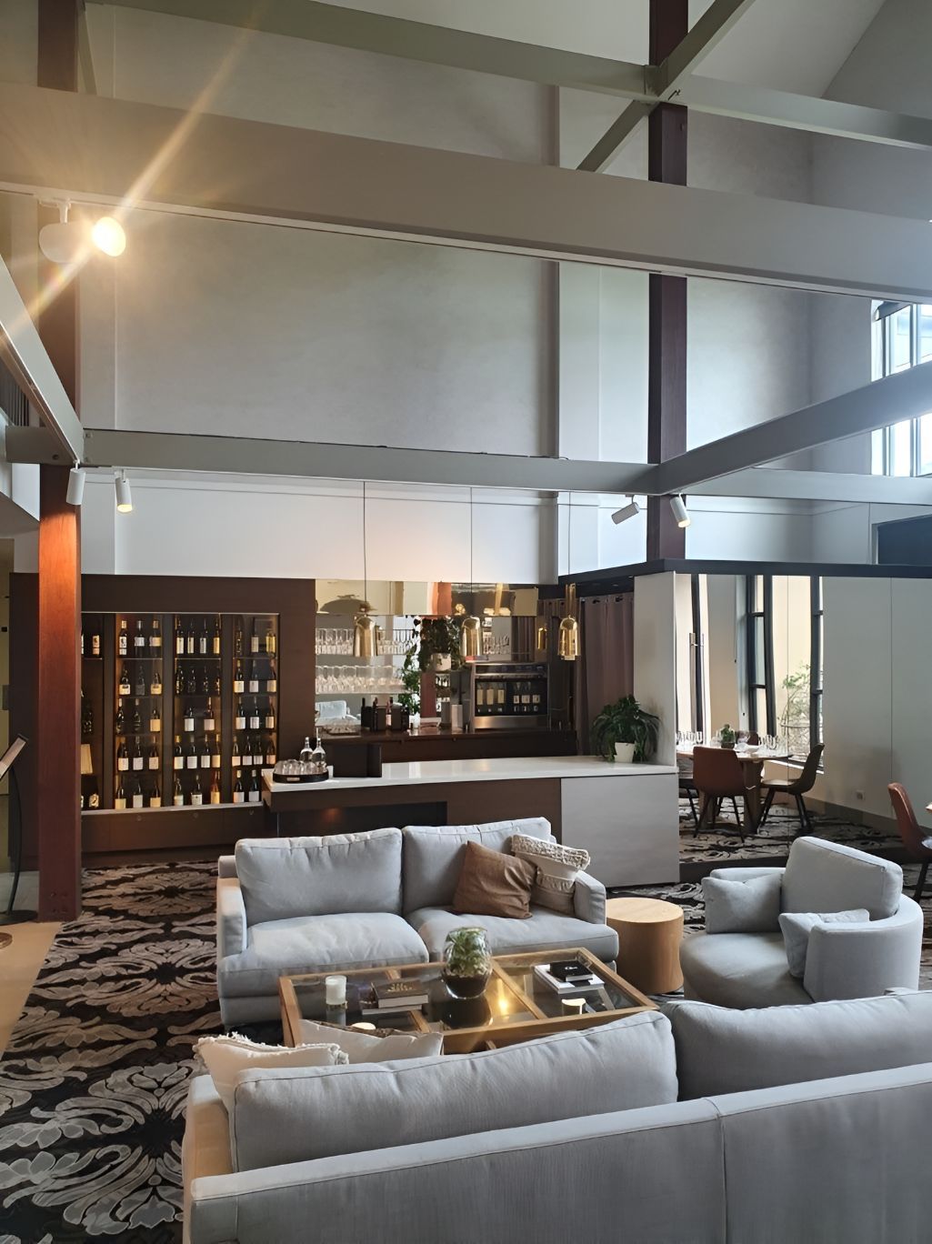 A Living Room With A Lot Of Furniture And Light — Entire Power Solutions In Maitland, NSW