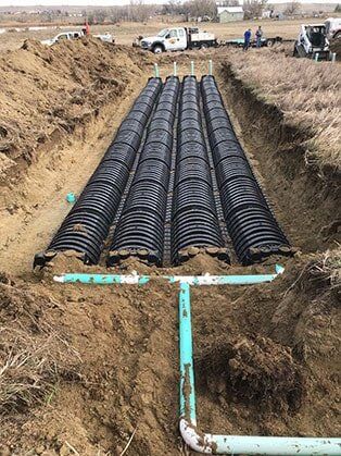 Set of Underground Pipes — Road Grading in Laporte, CO