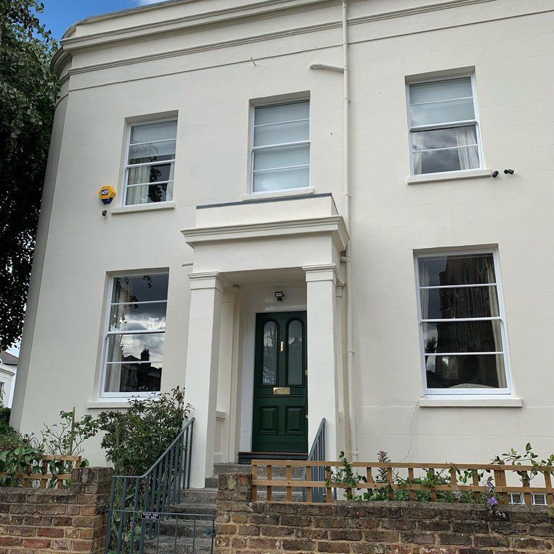 exterior of large white house