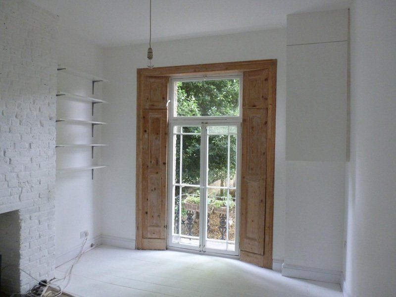 large window with white and wooden frames
