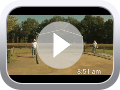 A video of people playing a game with a play button in the middle.