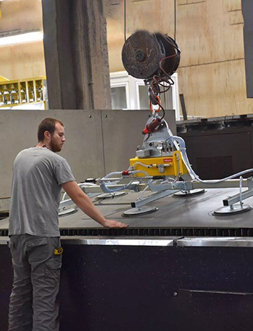 Man working with suction crane — Mini Crane Hire In Alstonville, NSW