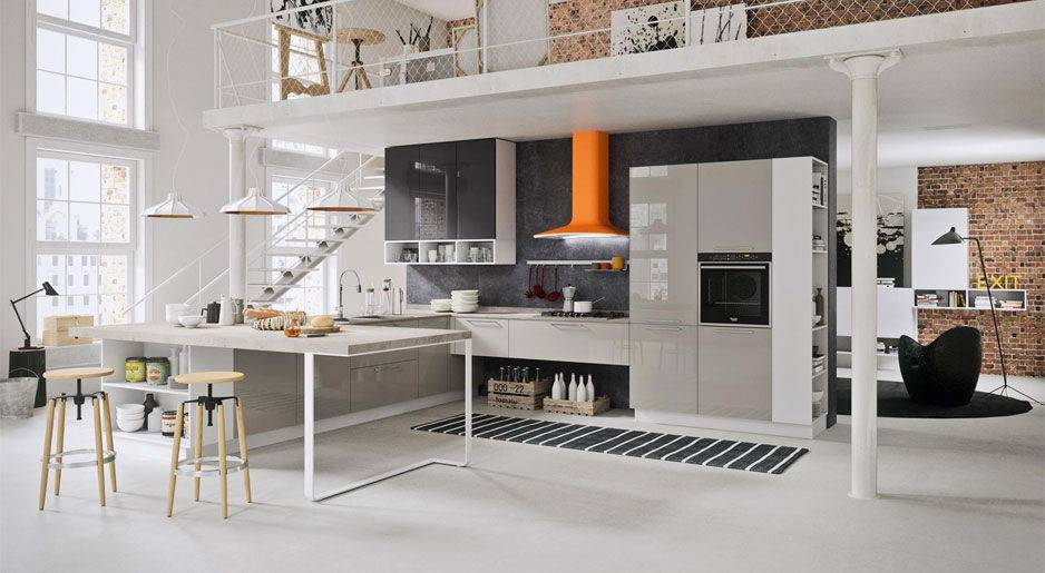 open space con soppalco e cucina moderna